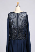 Navy A-line chiffon gown with glittering beaded back panel and long sleeves