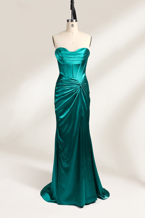 
A mannequin showcases a teal satin strapless gown. It has a ruched bodice, a fitted silhouette, and a flowing, floor - length skirt with a subtle train. The elegant design, featuring gathered details, makes it suitable for formal events like galas or weddings.1