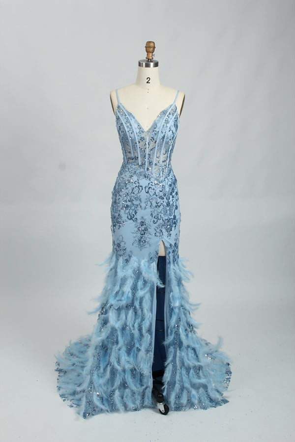 Illuminated softly, a woman captivates in a pink - purple evening gown. With sequin and feather details, a mermaid silhouette, and a high slit, it creates a glamorous and alluring look for formal events.8