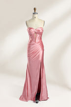 Against a gentle, light - colored backdrop, a mannequin showcases a strapless pink satin gown. The bust flaunts a twisted design, with a sheer insert at the bodice, and the waist is adorned with ruching. The mermaid - style skirt, featuring a high side slit, radiates elegance, perfect for formal galas.1