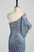 Blue one-shoulder beaded bodice with draped sleeve and vertical sparkle trim
