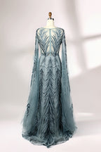 Showcased on a mannequin is a light - teal evening gown. It features a sheer high - neck design, long flowing sleeves, and intricate leaf - pattern embroidery. The gown's elegant and unique design exudes a sense of sophistication and grace, making it an ideal choice for formal events.
2