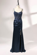 This is a floor - length evening dress in a deep navy hue. It has a strapless style with thin shoulder straps. The bodice is embellished with delicate beadwork and embroidery, creating an elegant and glamorous look. The skirt is form - fitting around the hips and flows down to the floor, featuring a side slit that adds allure and allows for easy movement. Displayed on a mannequin against a simple, light - colored backdrop, the dress exudes sophistication, perfect for special occasions like galas or proms.01