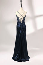 This is a floor - length evening dress in a deep navy hue. It has a strapless style with thin shoulder straps. The bodice is embellished with delicate beadwork and embroidery, creating an elegant and glamorous look. The skirt is form - fitting around the hips and flows down to the floor, featuring a side slit that adds allure and allows for easy movement. Displayed on a mannequin against a simple, light - colored backdrop, the dress exudes sophistication, perfect for special occasions like galas or proms.02