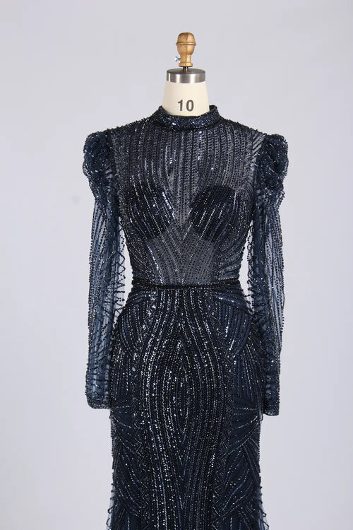 Navy sequin high-neck gown with long sleeves and embellished waist, fitted skirt
