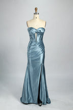 Against a gentle, light - colored backdrop, a mannequin showcases a strapless pink satin gown. The bust flaunts a twisted design, with a sheer insert at the bodice, and the waist is adorned with ruching. The mermaid - style skirt, featuring a high side slit, radiates elegance, perfect for formal galas.7