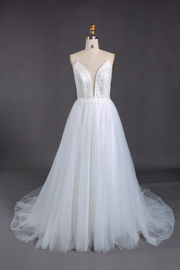 Plunging V - neck, spaghetti straps, lace bodice & tulle wedding dress.