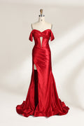  mannequin showcases a strapless red satin gown against a light - hued backdrop. It features an off - shoulder, twisted bodice with a sheer panel and a high side slit. The smooth satin fabric and elegant silhouette radiate sophistication, ideal for formal dinners or charity balls.1
