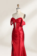  mannequin showcases a strapless red satin gown against a light - hued backdrop. It features an off - shoulder, twisted bodice with a sheer panel and a high side slit. The smooth satin fabric and elegant silhouette radiate sophistication, ideal for formal dinners or charity balls.4