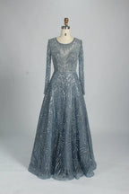 Sparkly illusion long-sleeve A-line mother of the bride dress, V-neck, teal-silver beading.