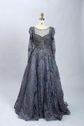 Dark blue beaded illusion A-line mother-of-the-bride dress with long illusion sleeves