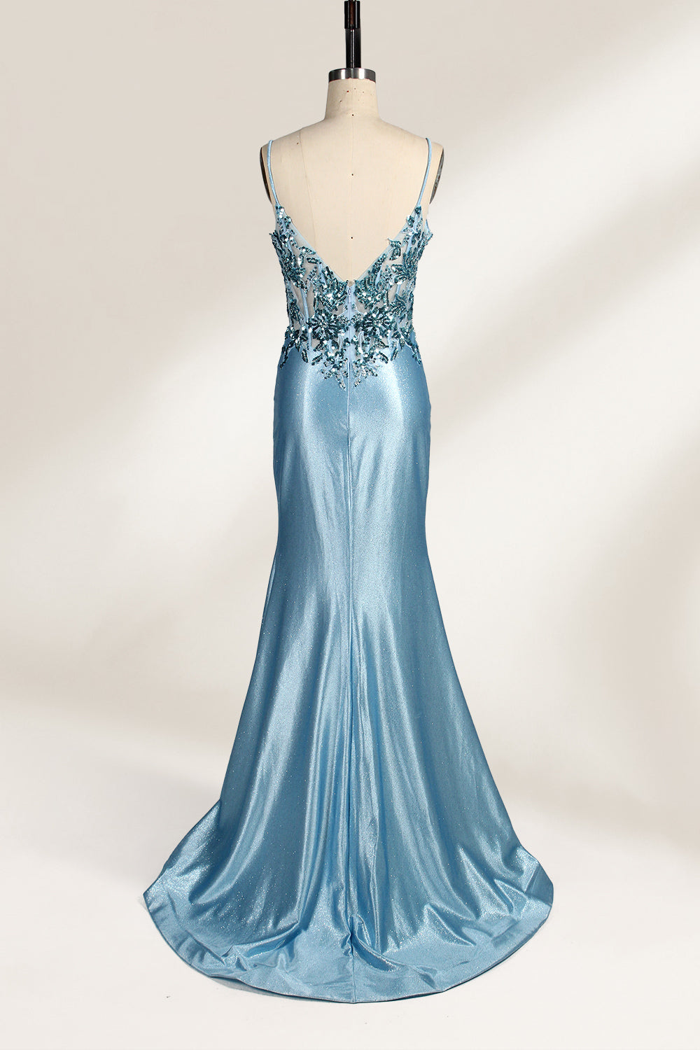 A mannequin showcases a lavender - purple satin gown. It has thin straps, a V - neck, floral - beaded bodice, and a high side slit. The elegant design, blending satin and intricate beadwork, suits formal events like galas or proms, radiating charm.2