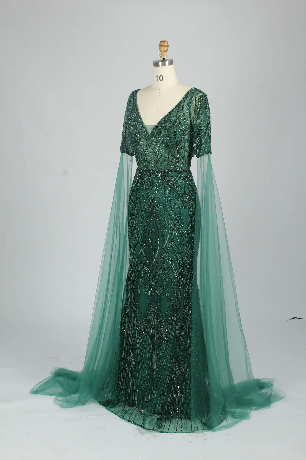 Embellished mermaid V-neck dress with cape sleeves and dark green sequins