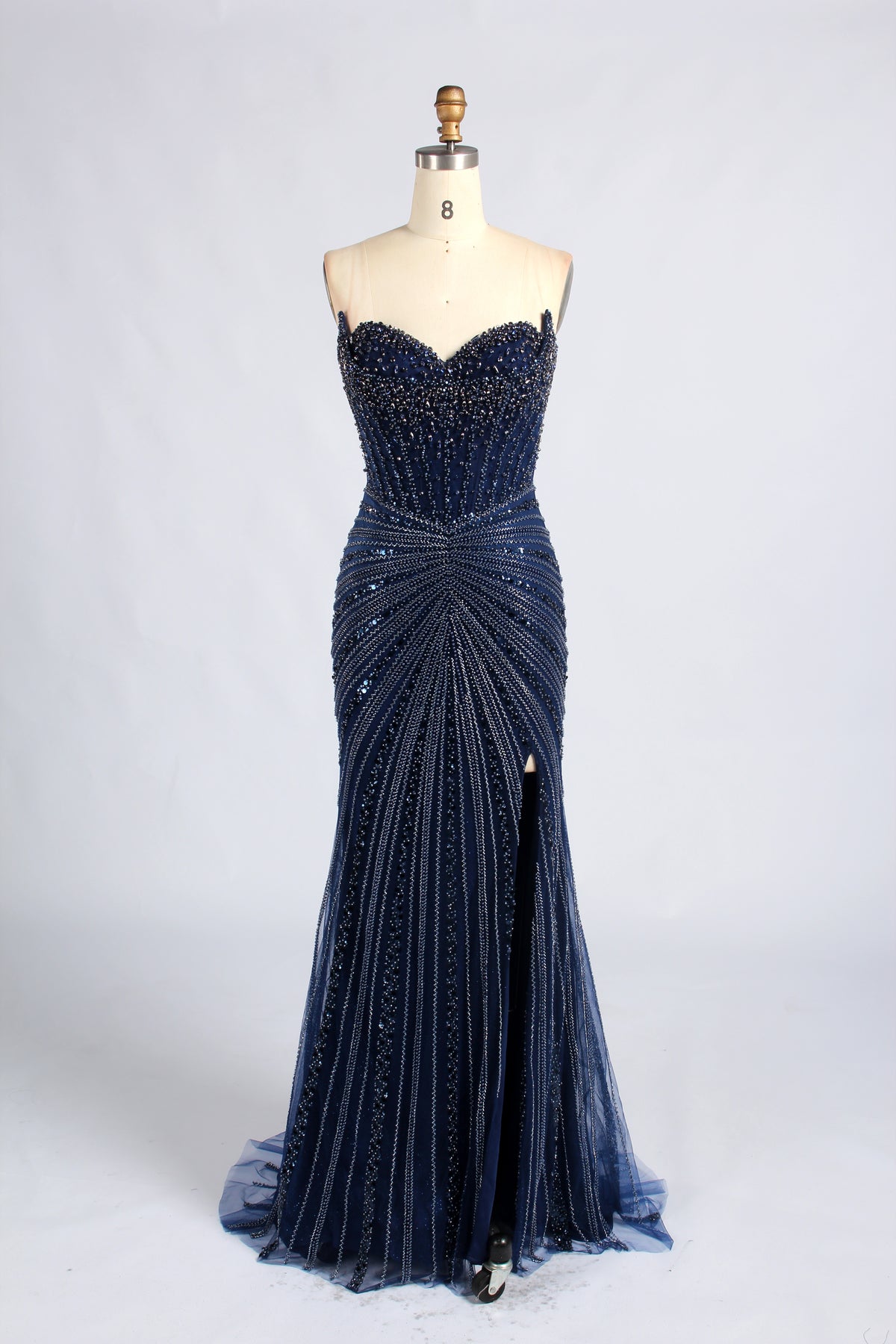 Navy strapless beaded mermaid prom dress with sweetheart neckline