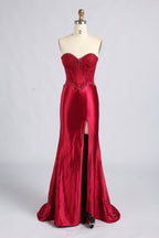 Red strapless satin mermaid prom dress with beaded corset bodice