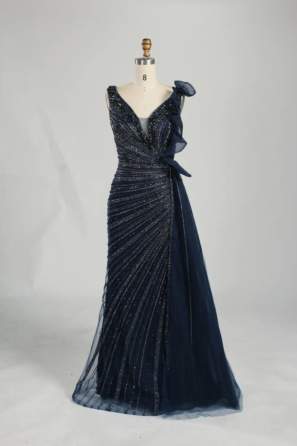 Navy beaded V-neck long dress with lace shoulder ruffles and bow