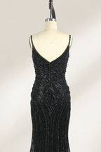 Set against a light background, a mannequin presents a grey tulle gown. It has thin straps, a sweetheart neckline, and a mermaid - shaped skirt. The detailed silver bead embroidery creates an elegant pattern, making it ideal for formal events like proms, radiating sophistication.6