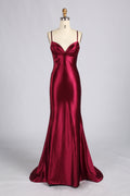 Burgundy satin mermaid prom dress with spaghetti straps and sweetheart neckline bow