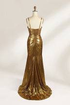 A golden strapless evening gown is displayed on a mannequin. The bodice is adorned with intricate beadwork, and the skirt, made of a shiny metallic fabric, features a high side slit and a small train, creating a glamorous and elegant look, perfect for formal events.2