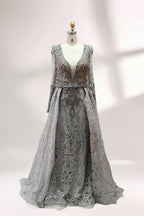 Displayed on a mannequin is a light - gray evening gown. It has a deep V - neckline, long sleeves, and intricate lace embroidery with a grid pattern. The elegant design gives off a luxurious and sophisticated vibe, ideal for formal occasions.3