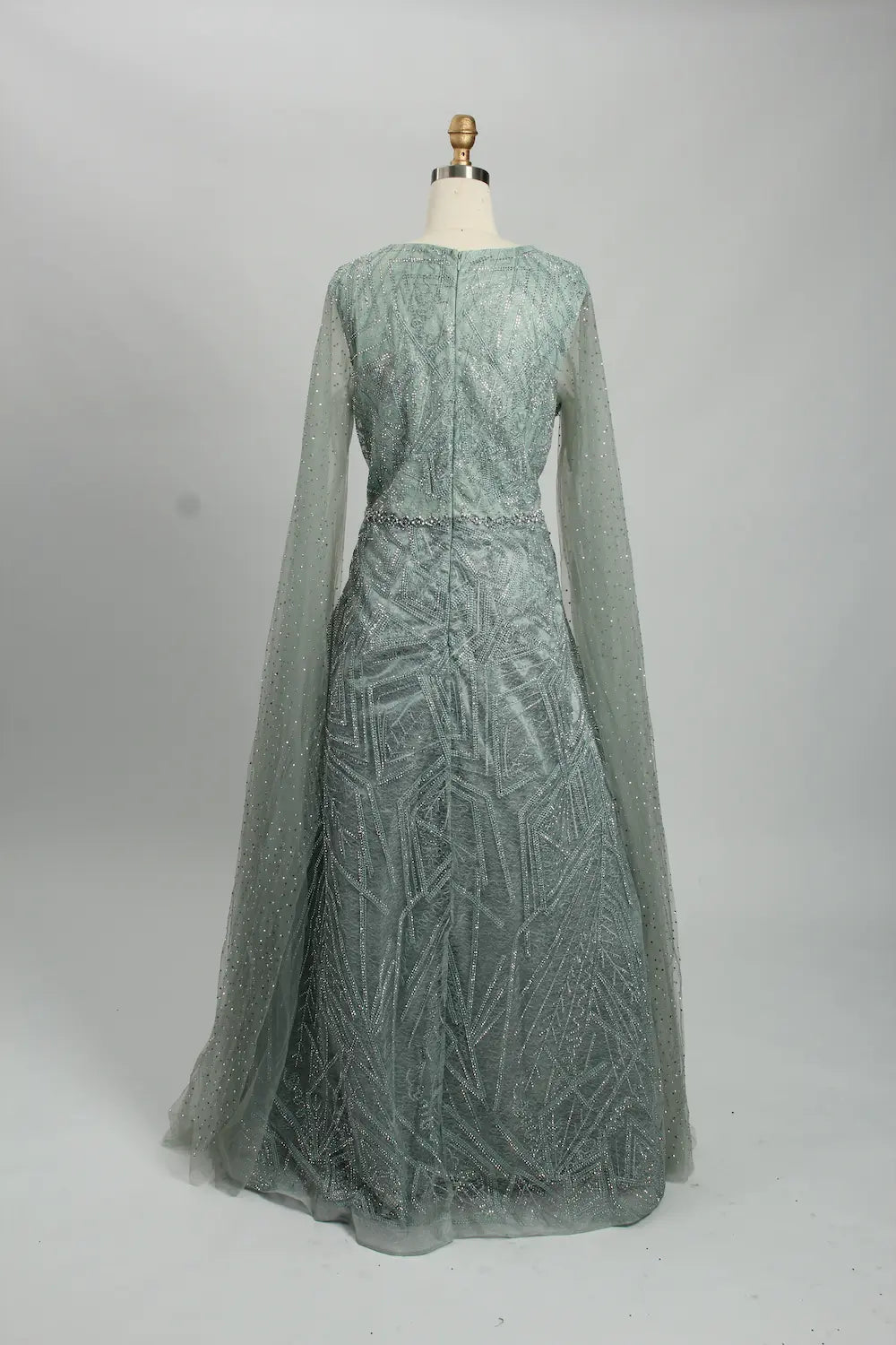 Teal beaded A-line evening dress with long sheer sleeves and fitted waist