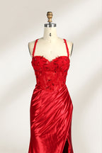 On a mannequin against a light background, there’s a red satin gown. It has thin, delicate straps and a sweetheart neckline. The bodice is adorned with sequin - detailed lace, adding a touch of glamour. The skirt, ruched and mermaid - shaped, features a high side slit and a flowing train. The shiny satin fabric and sequin embellishments make it perfect for formal events like galas.5