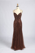 Brown beaded mermaid prom gown with a V-neck, spaghetti straps, and a fitted silhouette