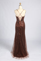 Back of the brown beaded gown with crisscross straps, lace-up detail, and a flared hem