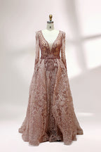 Displayed on a mannequin is a light - gray evening gown. It has a deep V - neckline, long sleeves, and intricate lace embroidery with a grid pattern. The elegant design gives off a luxurious and sophisticated vibe, ideal for formal occasions.4