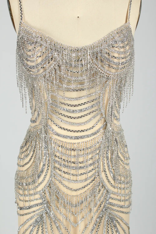 Sleeveless beaded mermaid evening dress with spaghetti straps and layered chain detailing