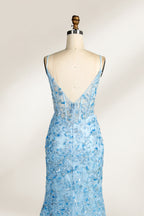 A mannequin showcases a light - blue tulle gown. It has thin straps, a V - neck, floral embroidery, and a high side slit. The intricate design, with sheer bodice details, suits formal events like galas or proms, radiating elegance and charm.6