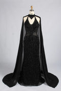 Black beaded halter mermaid gown with draped shoulder cape and V-neck detail