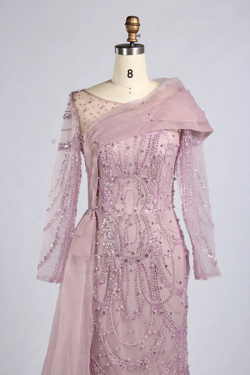 Dusty pink mermaid gown with asymmetric neckline, sheer draped sleeves, and bead-embellished bodice