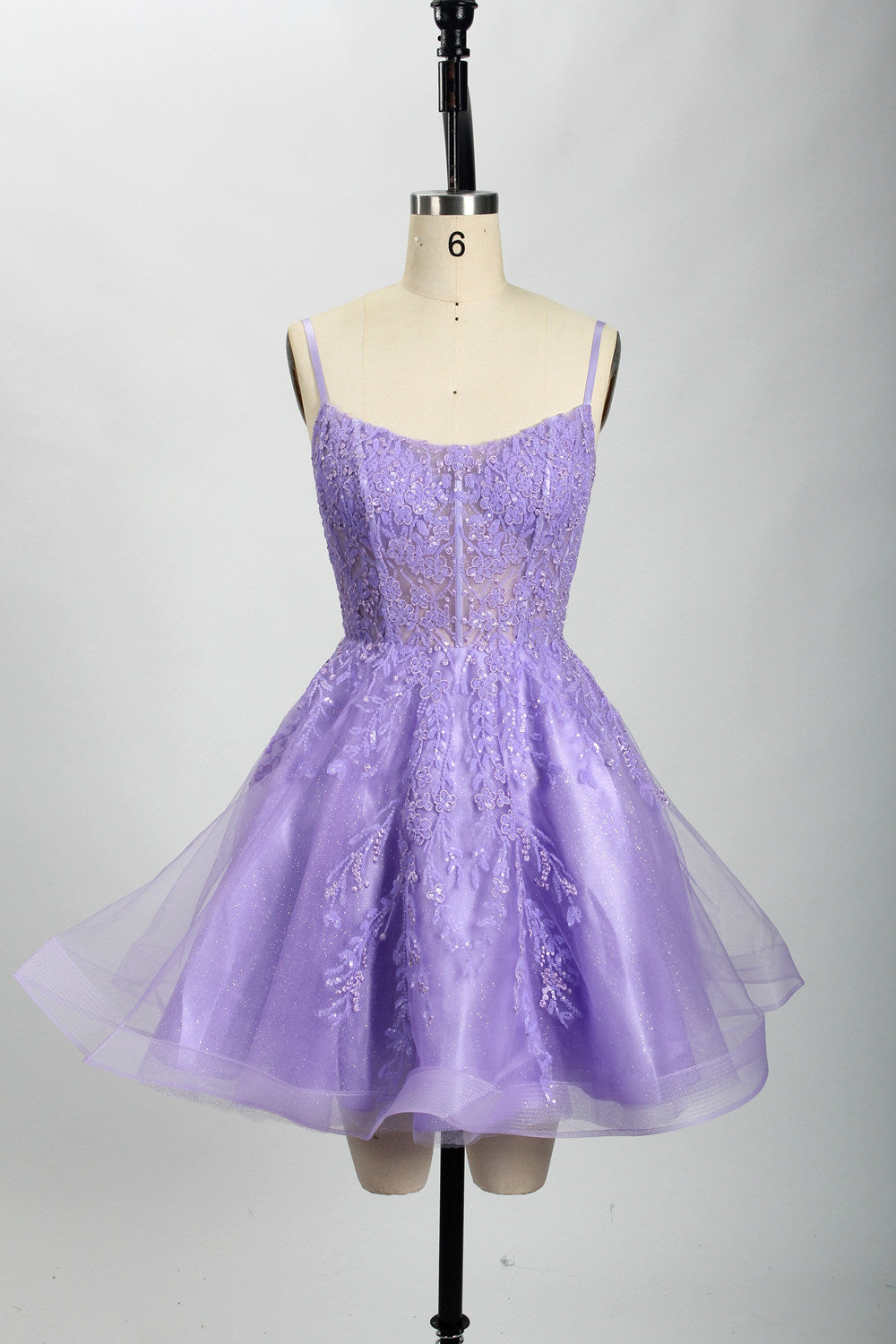 A mannequin displays a royal - blue, short - length gown with thin straps. The bodice and skirt are adorned with sparkling sequins and floral lace. The tulle skirt adds a fluttery, feminine touch, perfect for semi - formal events like homecoming or cocktail parties, exuding youthful charm.6
