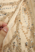 Champagne beaded sequin fabric with rhinestone accents for one-shoulder gown