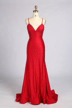 Red beaded mermaid prom dress with spaghetti straps and V-neck; fitted skirt