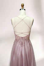 Blush pink tulle prom dress with beaded sheer bodice, V-neck, criss-cross back & flowing skirt. Elegant, dreamy design—perfect for bulk premium partywear stock.06