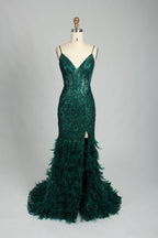 Illuminated softly, a woman captivates in a pink - purple evening gown. With sequin and feather details, a mermaid silhouette, and a high slit, it creates a glamorous and alluring look for formal events.9