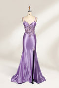 A mannequin showcases a lavender - purple satin gown. It has thin straps, a V - neck, floral - beaded bodice, and a high side slit. The elegant design, blending satin and intricate beadwork, suits formal events like galas or proms, radiating charm.1