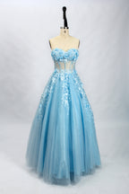 Bathed in soft light, a woman radiates grace in a mint - green evening gown. With floral details, sheer waist, and tulle skirt, it crafts a romantic and elegant look for formal events.8