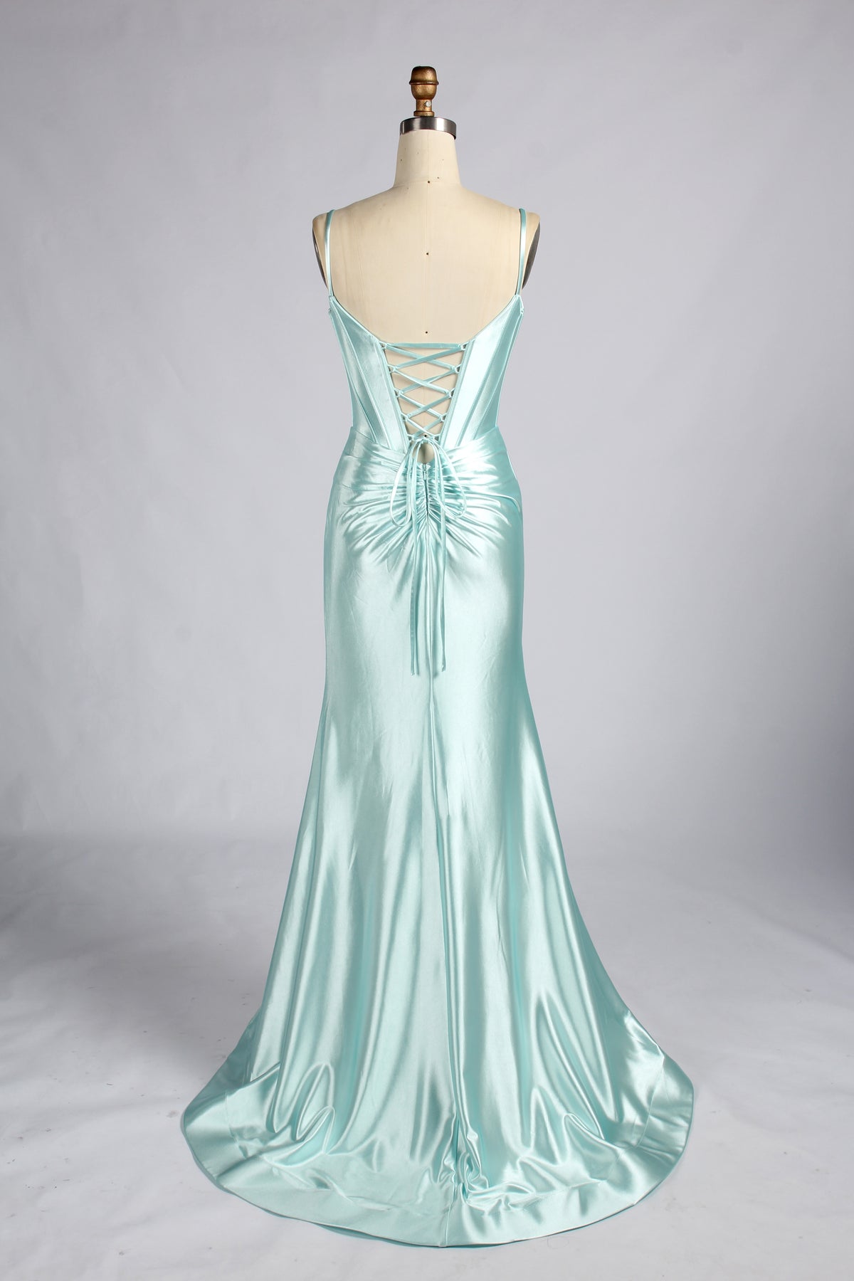 Mint satin mermaid prom dress with spaghetti straps and open back corset lacing