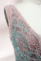 Displayed on a mannequin is a pink - hued evening gown. It features a deep V - neckline, intricate floral embroidery in shades of blue and pink, and a flowing skirt. The elegant design creates a romantic and sophisticated look, perfect for formal events.6