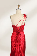 A mannequin displays a teal satin gown. It features a deep V - neckline with lace embroidery on the bodice, a ruched skirt, and a mermaid silhouette. The elegant details and shiny fabric create a glamorous look, perfect for formal events like proms or galas.10