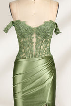 A mannequin showcases an olive - green gown. It has off - the - shoulder, lace - detailed sleeves, a sheer bodice with floral embroidery, and a high side slit. The elegant design, blending satin and lace, suits formal events like galas, radiating charm.5