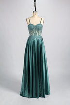 A mannequin showcases a champagne - satin gown. It has thin straps, a sheer lace - detailed bodice, and a voluminous skirt. The elegant design, blending satin and intricate lace, suits formal events like weddings, radiating sophistication.7