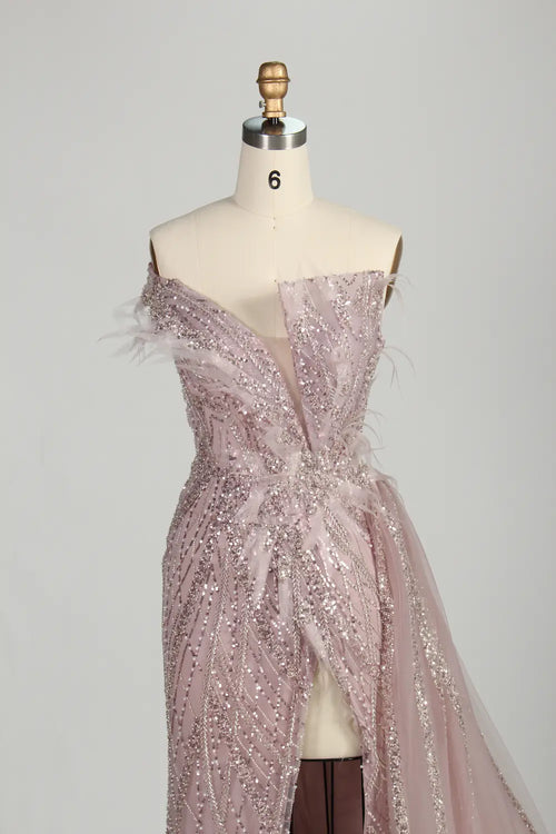 Blush pink sequin off-shoulder evening dress with feathered shoulder detail