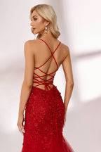 photo of beautiful blonde woman wearing elegant red evening gown with sequins, long fitted dress with sheer tulle skirt, standing in front of white background with soft shadows, light skin tone, wavy hair, red lipstick, confident pose, glamorous, high fashion, studio lighting, full body shot, no accessories except earrings, modern and chic style, full-length shot.KT1278C-04