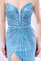 photo of a beautiful woman in a stunning blue ball gown with a plunging neckline and thigh-high slit, standing confidently in a studio with soft, diffused lighting, elegant and glamorous, full-length dress with intricate beadwork, long brunette hair styled in an elegant updo, fair skin, red lipstick, high heels, minimalist white background, fashion photography, stylish and sophisticated, no watermarks.KT1432-03