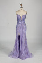 photo of a beautiful woman in a stunning blue ball gown with a plunging neckline and thigh-high slit, standing confidently in a studio with soft, diffused lighting, elegant and glamorous, full-length dress with intricate beadwork, long brunette hair styled in an elegant updo, fair skin, red lipstick, high heels, minimalist white background, fashion photography, stylish and sophisticated, no watermarks.KT1432-10