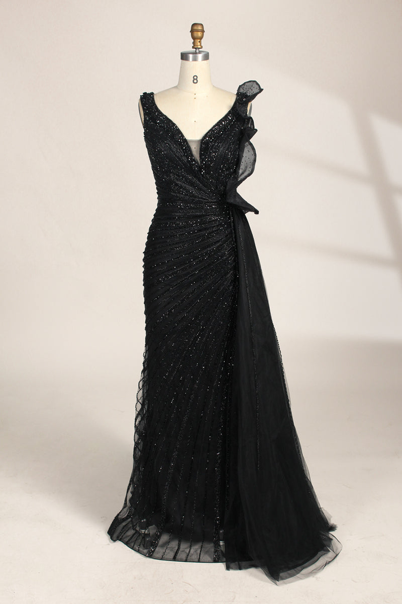photograph of a mannequin wearing a stunning black evening gown, full-length, sleeveless, deep V-neck, intricate beadwork, flowing chiffon skirt, elegant, sophisticated, fashion, haute couture, runway model, high fashion, elegant design, detailed textures, luxurious, black and white, fashion photography, studio setting, plain background, soft lighting, shadow play, chic, elegant, classy, high-end fashion, glamour, haute couture fashion, evening wear.MC124-01